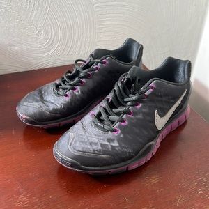 Gray and purple Nike free runs